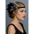 Black 1920s feather headband with silver beaded Art Deco flower, side view showing feather cluster