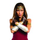 Wonder Woman costume accessory kit with gold gauntlets, tiara and arm band on white background