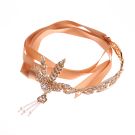 Rose gold 1920s flapper headband with Art Deco crystal leaf motif and pearl tassel
