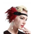Adult woman wearing burgundy feather flapper headband across forehead in vintage style