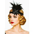 Black sequined flapper headband with large flower and feather plume worn across forehead