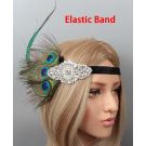 1920s Great Gatsby headband showing art-deco rhinestone centerpiece and iridescent peacock plumes