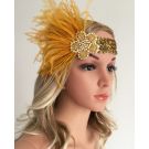 Adult gold flapper headband with sequined band and feather plume on white background