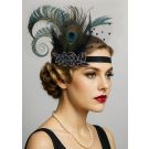 1920s peacock feather headband with iridescent eye feather and black veil on model