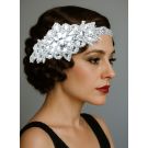 Adult 1920s flapper headband with oversized crystal rhinestone flower appliqué on silver-tone elastic band