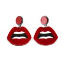 Red enamel lip dangle earrings with circular stud tops on white background
