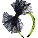 Neon green 80s headband with black lace bow and reptile print
