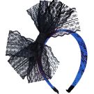 Adult 80s lace bow headband with blue snakeskin base and black ruffled bow