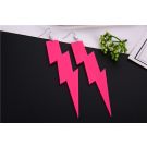 Hot pink lightning bolt earrings with geometric zigzag cutouts on white background