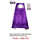 Child wearing double-sided satin cape showing velcro neck closure and eye mask
