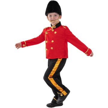 Child wearing red British Royal Guard jacket with gold trim and tall black bearskin hat