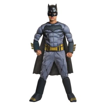 Child wearing Batman jumpsuit with attached gauntlets and boot tops
