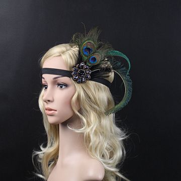 Black 1920s flapper headband with iridescent peacock feathers and jeweled brooch