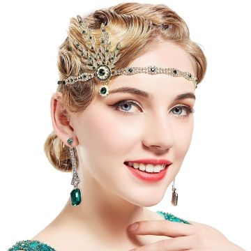 Gold 1920s flapper headband with emerald green rhinestones and Art Deco leaf spray design