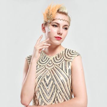 1920s flapper headpiece with peach feathers and gold art deco jewel