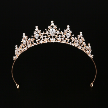 Gold princess tiara headband with teardrop centrepiece and sparkle accents