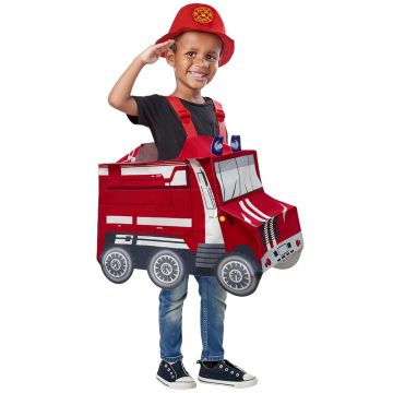 Child wearing red cardboard fire engine costume body over the shoulders with firefighter cap on head