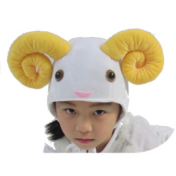 White plush sheep headpiece with golden spiral ram horns and embroidered face