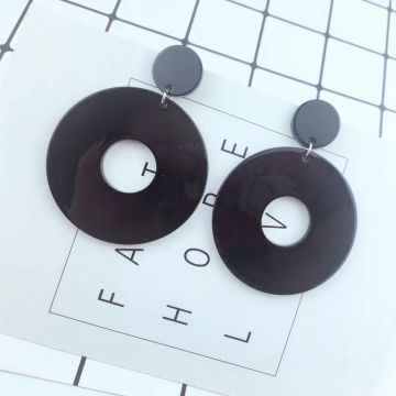 Bold geometric donut-ring disc earrings, hot pink acrylic