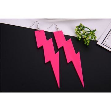 Hot pink lightning bolt earrings with geometric zigzag cutouts on white background