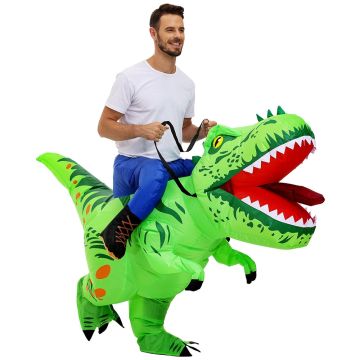 Adult wearing bright green inflatable Tyrannosaurus dinosaur ride-on costume with open jaw and spine spikes
