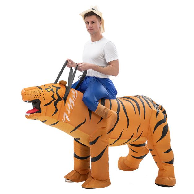 Adult riding inflatable orange tiger costume side view with roaring head Adult riding inflatable orange tiger costume side view with roaring head