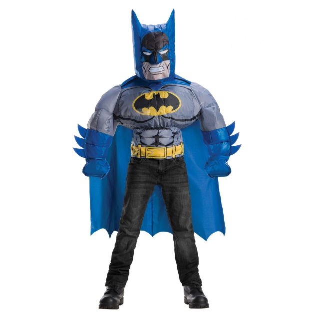 Child wearing inflatable Batman costume with muscular blue torso, grey chest armour and yellow bat symbol Child wearing inflatable Batman costume with muscular blue torso, grey chest armour and yellow bat symbol