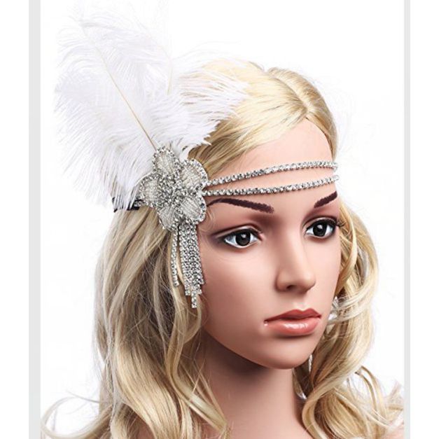 Silver 1920s flapper headband with white ostrich feather and crystal medallion Silver 1920s flapper headband with white ostrich feather and crystal medallion