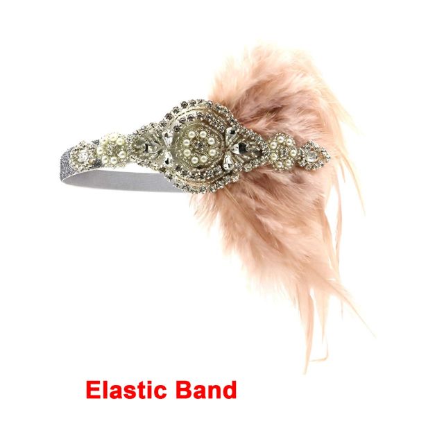 1920s flapper headband with rhinestone medallion and pink feather plume on elastic band 1920s flapper headband with rhinestone medallion and pink feather plume on elastic band