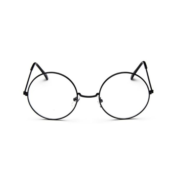 Old age spectacles prop showing oversized circular lens design