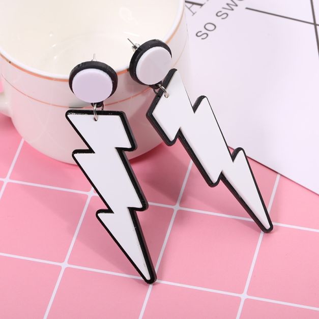 Adult lightning bolt dangle earrings showing zigzag chevron shape and post-back fittings Adult lightning bolt dangle earrings showing zigzag chevron shape and post-back fittings