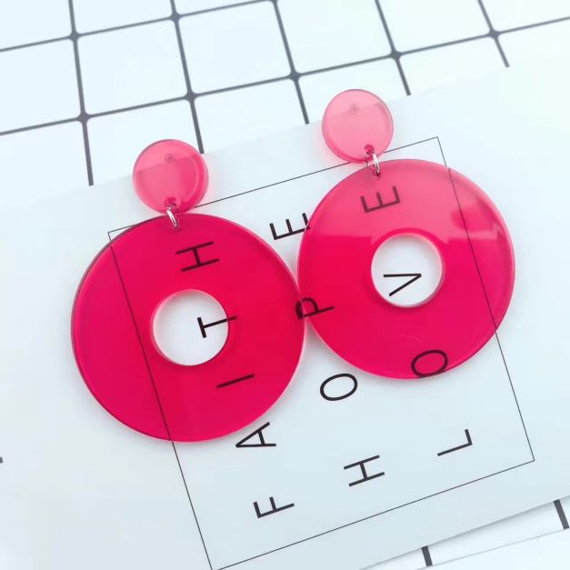 80s neon earrings shown in multiple colours - pink, yellow, white, black and red variants 80s neon earrings shown in multiple colours - pink, yellow, white, black and red variants