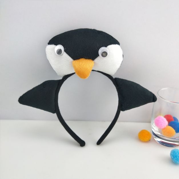 Kids penguin headband with 3D plush head and googly eyes