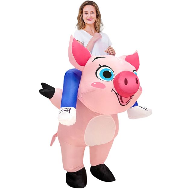Adult wearing pink inflatable pig costume with ride-on design and blue pants