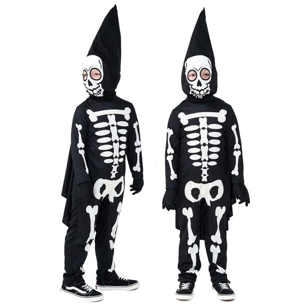 Full-body skeleton costume laid flat showing jumpsuit with attached cape, skull face hood and bone-print gloves Full-body skeleton costume laid flat showing jumpsuit with attached cape, skull face hood and bone-print gloves