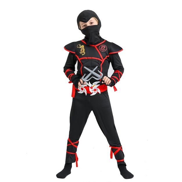 Child wearing full-body ninja jumpsuit with hood and martial arts accessories Child wearing full-body ninja jumpsuit with hood and martial arts accessories