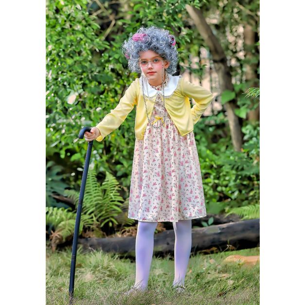 Kids grandma costume with yellow jacket and floral dress on white background