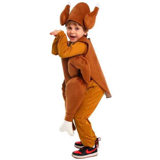 Child wearing plush turkey tabard vest with padded drumstick attachments